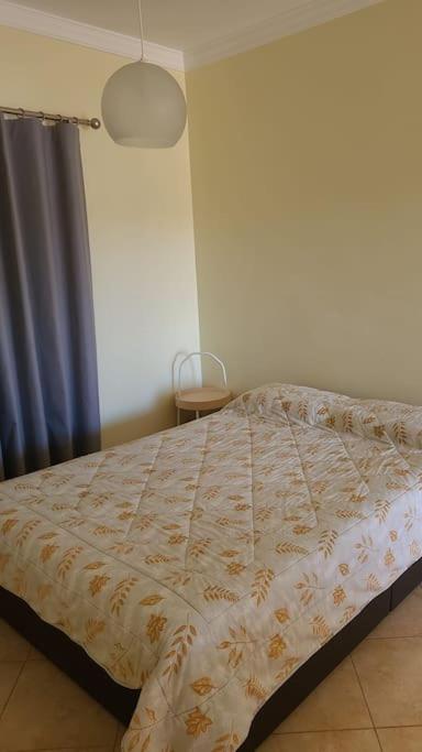Stela ' S Guest House Loule Bagian luar foto